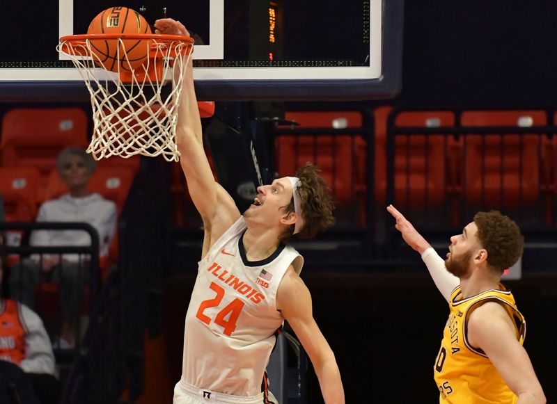 Feb 20, 2023; Champaign, Illinois, USA;  Illinois Fighting Illini forward Matthew Mayer (24) dunks the ball as Minnesota Golden Gophers forward Jamison Battle (10) looks on during the second half at State Farm Center. Mandatory Credit: Ron Johnson-USA TODAY Sports