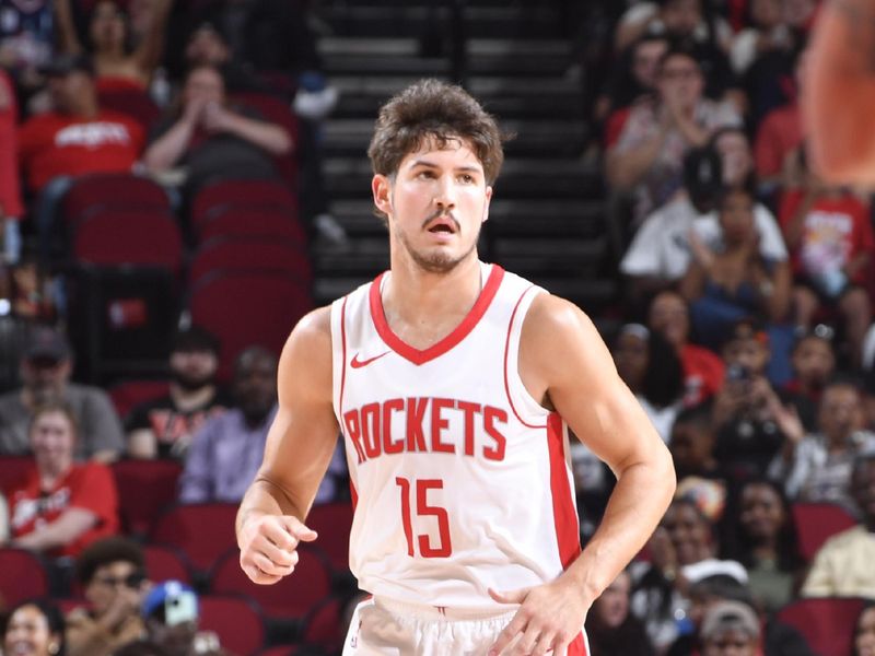 HOUSTON, TX - OCTOBER 15: Reed Sheppard #15 of the Houston Rockets looks on during the game against the New Orleans Pelicans during a NBA preseason game on October 15, 2024 at the Toyota Center in Houston, Texas. NOTE TO USER: User expressly acknowledges and agrees that, by downloading and or using this photograph, User is consenting to the terms and conditions of the Getty Images License Agreement. Mandatory Copyright Notice: Copyright 2024 NBAE (Photo by Logan Riely/NBAE via Getty Images)