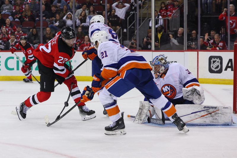 Oct 25, 2024; Newark, New Jersey, USA; New York Islanders goaltender Ilya Sorokin (30) makes a save against the New Jersey Devils during overtime at Prudential Center. Mandatory Credit: Ed Mulholland-Imagn Images