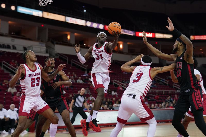 Feb 14, 2024; Fresno, California, USA; Fresno State Bulldogs forward Pierre Geneste Jr. (34) holds onto a rebound against the UNLV Rebels in the first half at the Save Mart Center. Mandatory Credit: Cary Edmondson-USA TODAY Sports