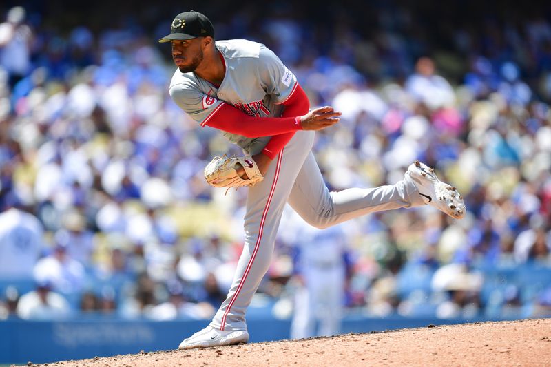 May 19, 2024; Los Angeles, California, USA; Cincinnati Reds pitcher Hunter Greene (21) throws against the Los Angeles Dodgers during the sixth inning at Dodger Stadium. Mandatory Credit: Gary A. Vasquez-USA TODAY Sports