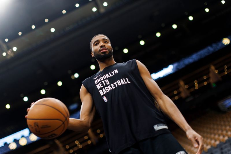 TORONTO, CANADA - FEBRUARY 22: Mikal Bridges #1 of the Brooklyn Nets warms up ahead of their NBA game against the Toronto Raptors at Scotiabank Arena on February 22, 2024 in Toronto, Canada. NOTE TO USER: User expressly acknowledges and agrees that, by downloading and or using this photograph, User is consenting to the terms and conditions of the Getty Images License Agreement. (Photo by Cole Burston/Getty Images)