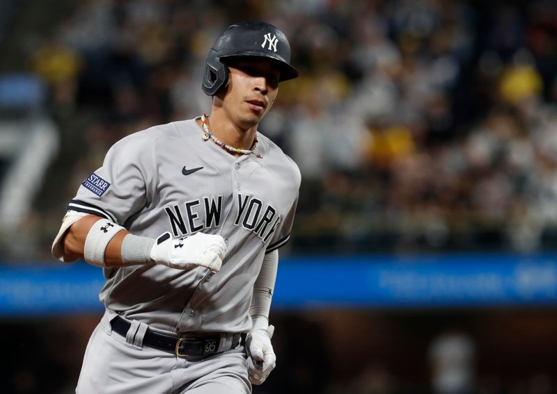 Sep 16, 2023; Pittsburgh, Pennsylvania, USA; New York Yankees left fielder Oswaldo Cabrera (95) circles the bases on a solo home run against the Pittsburgh Pirates during the eighth inning at PNC Park. Mandatory Credit: Charles LeClaire-USA TODAY Sports