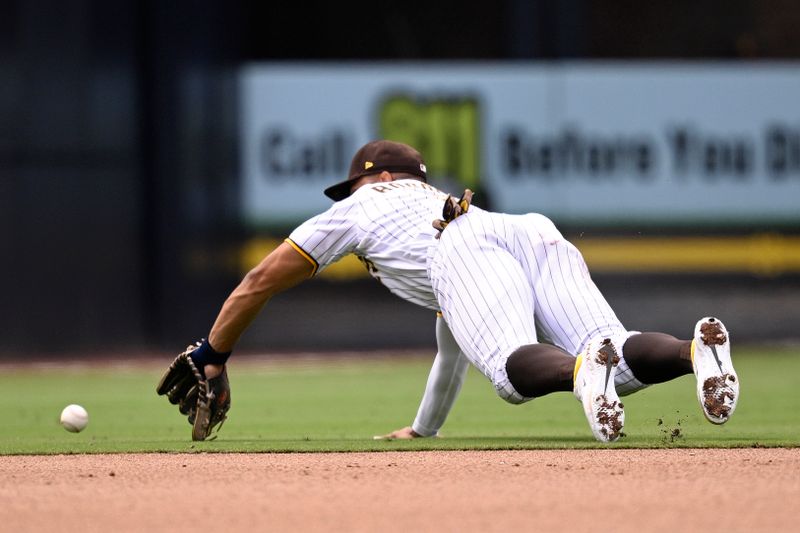 Aug 19, 2023; San Diego, California, USA; San Diego Padres shortstop Xander Bogaerts (2) dives for a ground ball during the seventh inning against the Arizona Diamondbacks at Petco Park. Mandatory Credit: Orlando Ramirez-USA TODAY Sports