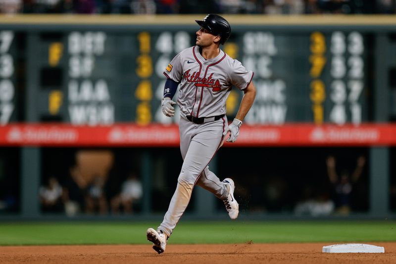 Aug 10, 2024; Denver, Colorado, USA; Atlanta Braves first baseman Matt Olson (28) rounds the bases on a two run home run in the seventh inning against the Colorado Rockies at Coors Field. Mandatory Credit: Isaiah J. Downing-USA TODAY Sports