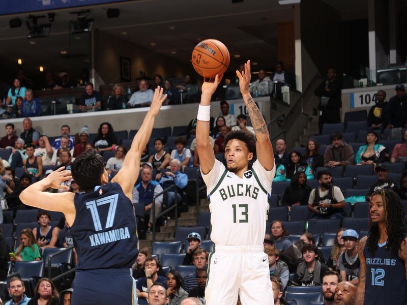 MEMPHIS, TN - OCTOBER 31: Ryan Rollins #13 of the Milwaukee Bucks shoots a three point basket during the game against the Memphis Grizzlies on October 31, 2024 at FedExForum in Memphis, Tennessee. NOTE TO USER: User expressly acknowledges and agrees that, by downloading and or using this photograph, User is consenting to the terms and conditions of the Getty Images License Agreement. Mandatory Copyright Notice: Copyright 2024 NBAE (Photo by Joe Murphy/NBAE via Getty Images)