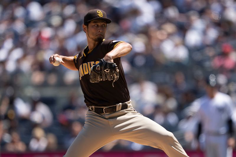 May 28, 2023; Bronx, New York, USA; San Diego Padres pitcher Yu Darvish (11) delivers a pitch against the New York Yankees during the first inning at Yankee Stadium. Mandatory Credit: Gregory Fisher-USA TODAY Sports