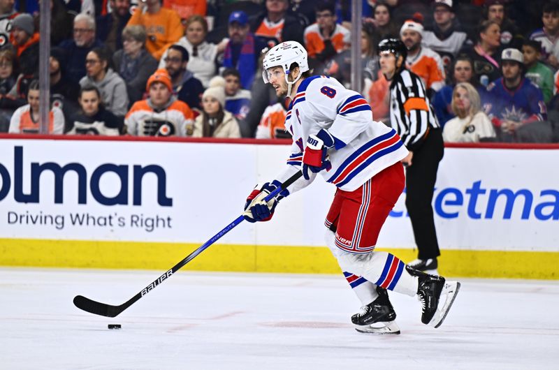 Feb 24, 2024; Philadelphia, Pennsylvania, USA; New York Rangers defenseman Jacob Trouba (8) controls the puck against the Philadelphia Flyers in the first period at Wells Fargo Center. Mandatory Credit: Kyle Ross-USA TODAY Sports