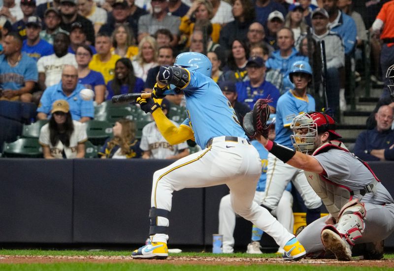 Sep 12, 2025; Milwaukee, Wisconsin, USA; Milwaukee Brewers shortstop Joey Ortiz (3) lays down a bunt against the St. Louis Cardinals in the third inning at American Family Field. Mandatory Credit: Michael McLoone-Imagn Images