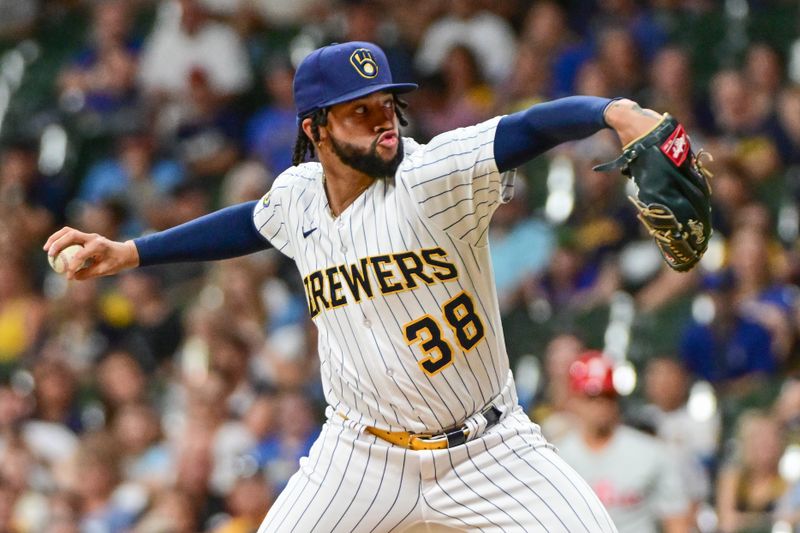 Sep 2, 2023; Milwaukee, Wisconsin, USA; Milwaukee Brewers pitcher Devin Williams (38) pitches against the Philadelphia Phillies in the ninth inning at American Family Field. Mandatory Credit: Benny Sieu-USA TODAY Sports