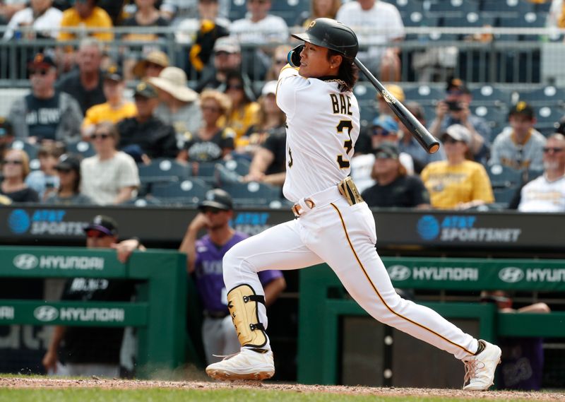 May 10, 2023; Pittsburgh, Pennsylvania, USA;  Pittsburgh Pirates center fielder Ji Hwan Bae (3) hits a double against the Colorado Rockies during the ninth inning at PNC Park. Colorado won 4-3. Mandatory Credit: Charles LeClaire-USA TODAY Sports