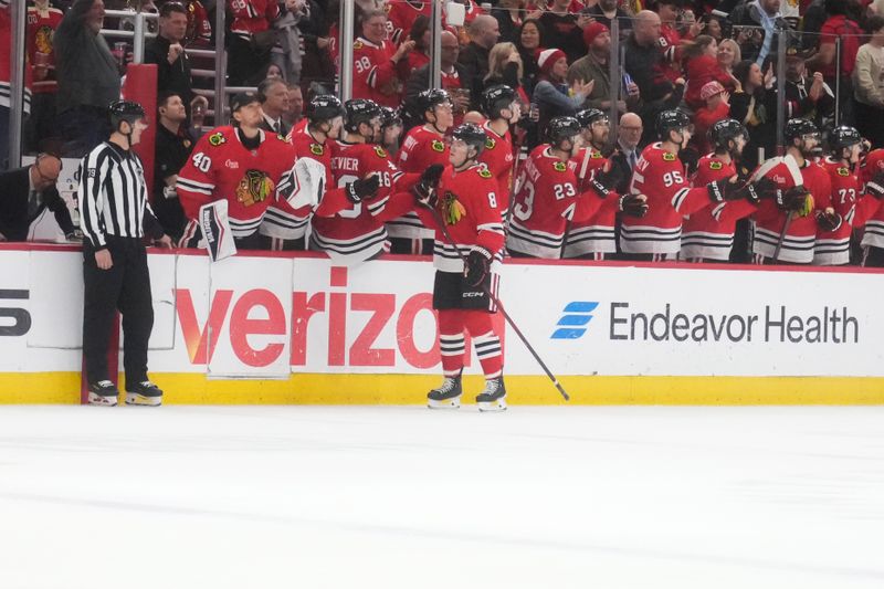 Mar 23, 2025; Chicago, Illinois, USA; Chicago Blackhawks center Ryan Donato (8) celebrates after his goal against the Philadelphia Flyers during the second period at United Center. Mandatory Credit: David Banks-Imagn Images