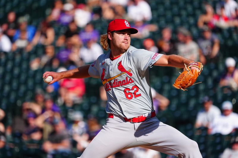 Sep 26, 2024; Denver, Colorado, USA; St. Louis Cardinals pitcher Kyle Leahy (62) delivers a pitch in the eighth inning against the Colorado Rockies at Coors Field. Mandatory Credit: Ron Chenoy-Imagn Images