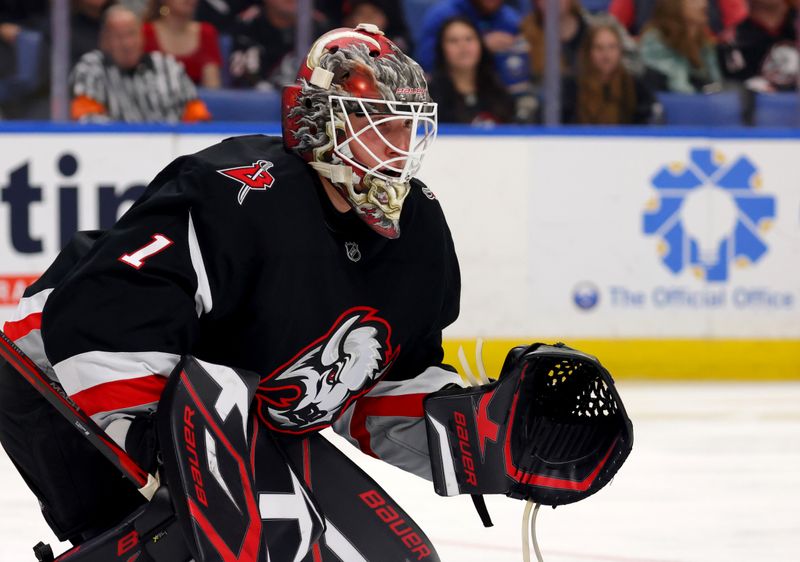 Oct 26, 2024; Buffalo, New York, USA;  Buffalo Sabres goaltender Ukko-Pekka Luukkonen (1) looks for the puck during the first period against the Detroit Red Wings at KeyBank Center. Mandatory Credit: Timothy T. Ludwig-Imagn Images