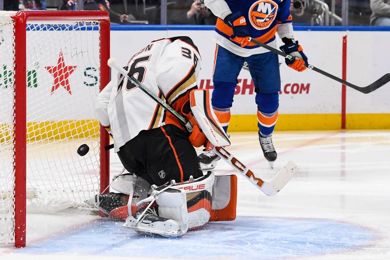 Dec 13, 2023; Elmont, New York, USA; New York Islanders center Kyle Palmieri (21) (not Pictured) scores a goal past Anaheim Ducks goaltender John Gibson (36) during the second period at UBS Arena. Mandatory Credit: Dennis Schneidler-USA TODAY Sports