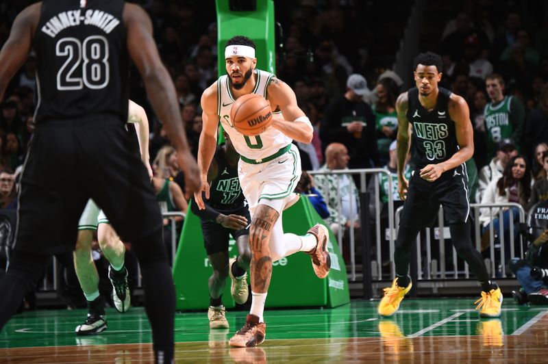 BOSTON, MA - FEBRUARY 14: Jayson Tatum #0 of the Boston Celtics handles the ball during the game against the Brooklyn Nets on February 14, 2024 at the TD Garden in Boston, Massachusetts. NOTE TO USER: User expressly acknowledges and agrees that, by downloading and or using this photograph, User is consenting to the terms and conditions of the Getty Images License Agreement. Mandatory Copyright Notice: Copyright 2024 NBAE  (Photo by Brian Babineau/NBAE via Getty Images)