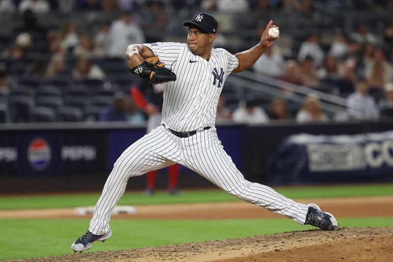 Aug 23, 2023; Bronx, New York, USA; New York Yankees relief pitcher Wandy Peralta (58) delivers a pitch during the ninth inning against the Washington Nationals at Yankee Stadium. Mandatory Credit: Vincent Carchietta-USA TODAY Sports