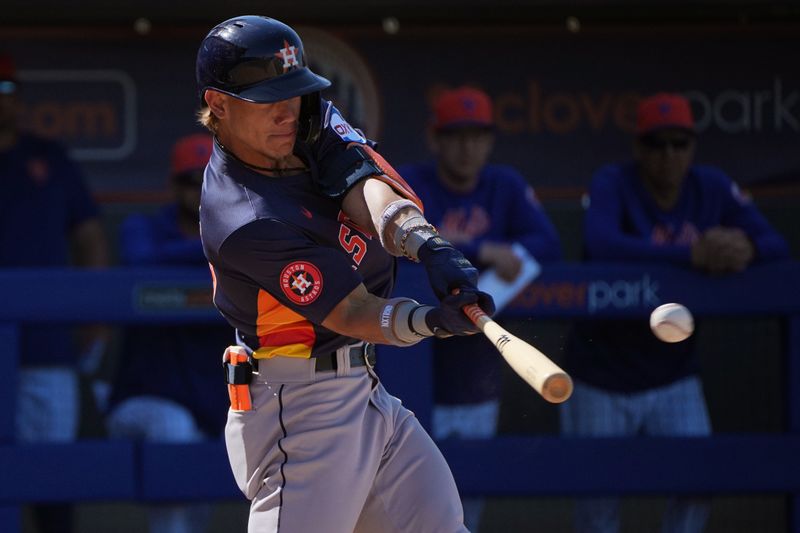 Feb 25, 2024; Port St. Lucie, Florida, USA;  Houston Astros outfielder Kenedy Corona (89) hits a single in the fifth inning against the New York Mets at Clover Park. Mandatory Credit: Jim Rassol-USA TODAY Sports