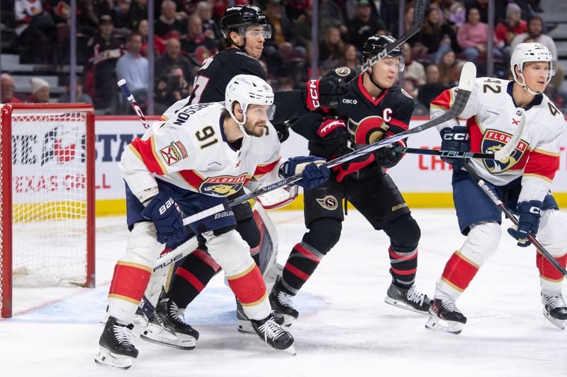 Apr 4, 2024; Ottawa, Ontario, CAN; Ottawa Senators center Shane Pinto (57) and left wing Brady Tkachuk(7) jockey for position in front of Florida Panthers goalie Sergei Bobrovsky (72) and around defensemen Oliver Ekman-Larsson (91) and Gustav Forsling (42) in the first period at the Canadian Tire Centre. Mandatory Credit: Marc DesRosiers-USA TODAY Sports