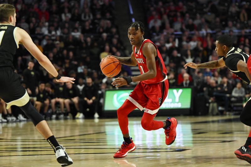 Jan 28, 2023; Winston-Salem, North Carolina, USA;  North Carolina State Wolfpack guard Jarkel Joiner (1) drives during the second half at Lawrence Joel Veterans Memorial Coliseum. Mandatory Credit: William Howard-USA TODAY Sports