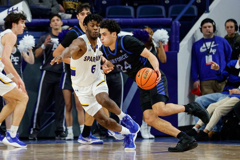 Jan 13, 2024; Colorado Springs, Colorado, USA; Air Force Falcons guard Jeffrey Mills (24) controls the ball against San Jose State Spartans guard Latrell Davis (6) in the first half at Clune Arena. Mandatory Credit: Isaiah J. Downing-USA TODAY Sports