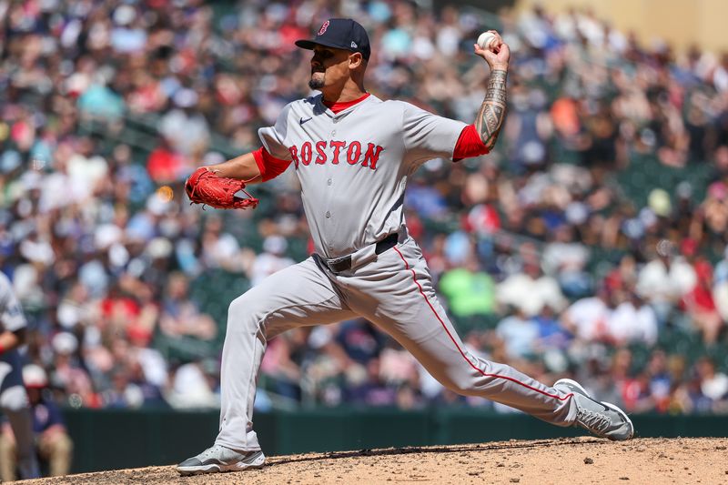 May 5, 2024; Minneapolis, Minnesota, USA; Boston Red Sox relief pitcher Brennan Bernardino (83) delivers a pitch against the Minnesota Twins during the fifth inning at Target Field. Mandatory Credit: Matt Krohn-USA TODAY Sports