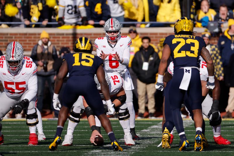 Nov 25, 2023; Ann Arbor, Michigan, USA; Ohio State Buckeyes quarterback Kyle McCord (6) gets set to run a play against the Michigan Wolverines at Michigan Stadium. Mandatory Credit: Rick Osentoski-USA TODAY Sports