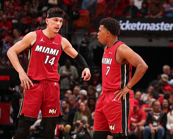 MIAMI, FL - DECEMBER 25:  Tyler Herro #14 of the Miami Heat & Kyle Lowry #7 of the Miami Heat looks on during the game on December 25, 2023 at Kaseya Center Arena in Miami, Florida. NOTE TO USER: User expressly acknowledges and agrees that, by downloading and or using this Photograph, user is consenting to the terms and conditions of the Getty Images License Agreement. Mandatory Copyright Notice: Copyright 2023 NBAE (Photo by Issac Baldizon/NBAE via Getty Images)