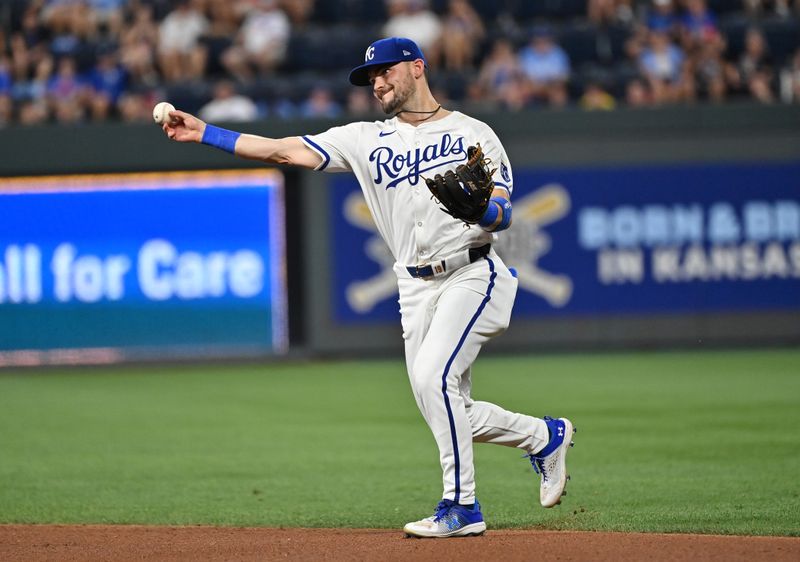 Aug 5, 2024; Kansas City, Missouri, USA;  Kansas City Royals second baseman Michael Massey (19) throws to first base for an out in the seventh inning against the Boston Red Sox at Kauffman Stadium. Mandatory Credit: Peter Aiken-USA TODAY Sports