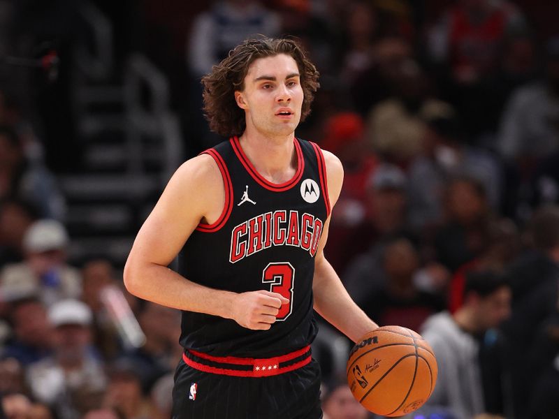 CHICAGO, ILLINOIS - NOVEMBER 07: Josh Giddey #3 of the Chicago Bulls dribbles up the court against the Minnesota Timberwolves during the first half at the United Center on November 07, 2024 in Chicago, Illinois. NOTE TO USER: User expressly acknowledges and agrees that, by downloading and or using this photograph, User is consenting to the terms and conditions of the Getty Images License Agreement.  (Photo by Michael Reaves/Getty Images)