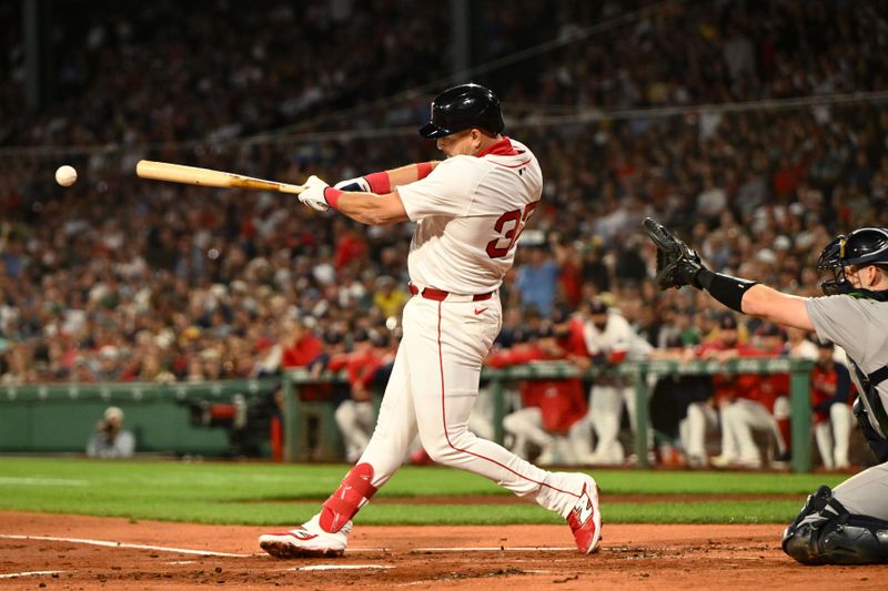 Sep 14, 2025; Boston, Massachusetts, USA; Boston Red Sox first baseman Nathaniel Lowe (37) hits a RBI single against the New York Yankees during the first inning at Fenway Park. Mandatory Credit: Brian Fluharty-Imagn Images