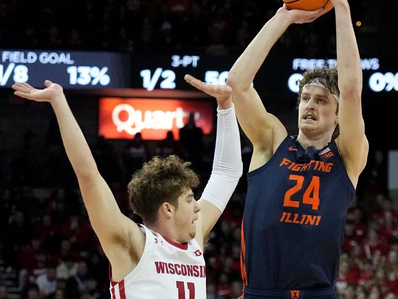 Jan 1, 2023; Madison, Wis, USA; Wisconsin guard Max Klesmit (11) fouls Illinois forward Matthew Mayer (24) during the first half of their game at the Kohl Center. Mandatory Credit: Mark Hoffman/Milwaukee Journal Sentinel via USA TODAY NETWORK