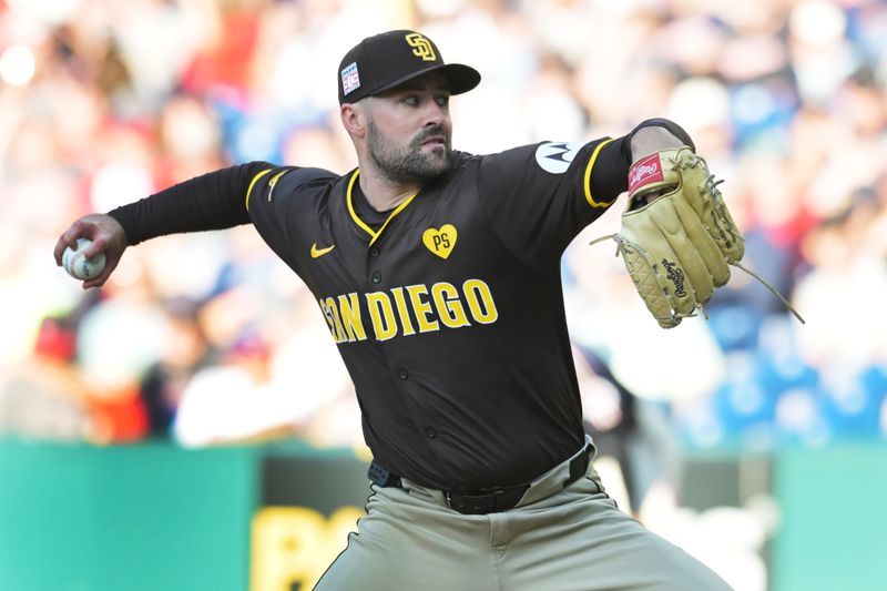 Jul 19, 2024; Cleveland, Ohio, USA; San Diego Padres starting pitcher Matt Waldron (61) throws a pitch during the first inning against the Cleveland Guardians at Progressive Field. Mandatory Credit: Ken Blaze-USA TODAY Sports