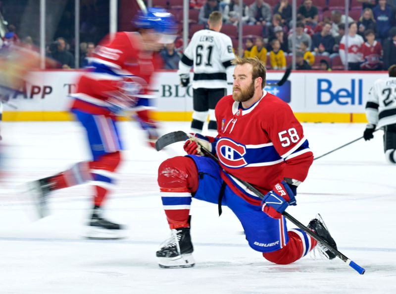 Oct 17, 2024; Montreal, Quebec, CAN; Montreal Canadiens defenseman David Savard (58) stretches during the warmup period before the game against the Los Angeles Kings at the Bell Centre. Mandatory Credit: Eric Bolte-Imagn Images