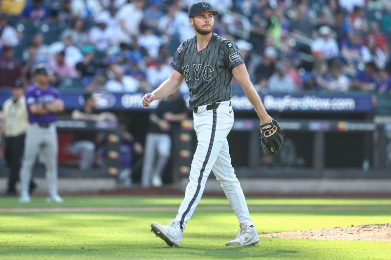 Jul 13, 2024; New York City, New York, USA;  New York Mets starting pitcher Christian Scott (45) is taken out of the game in the fifth inning against the Colorado Rockies at Citi Field. Mandatory Credit: Wendell Cruz-USA TODAY Sports