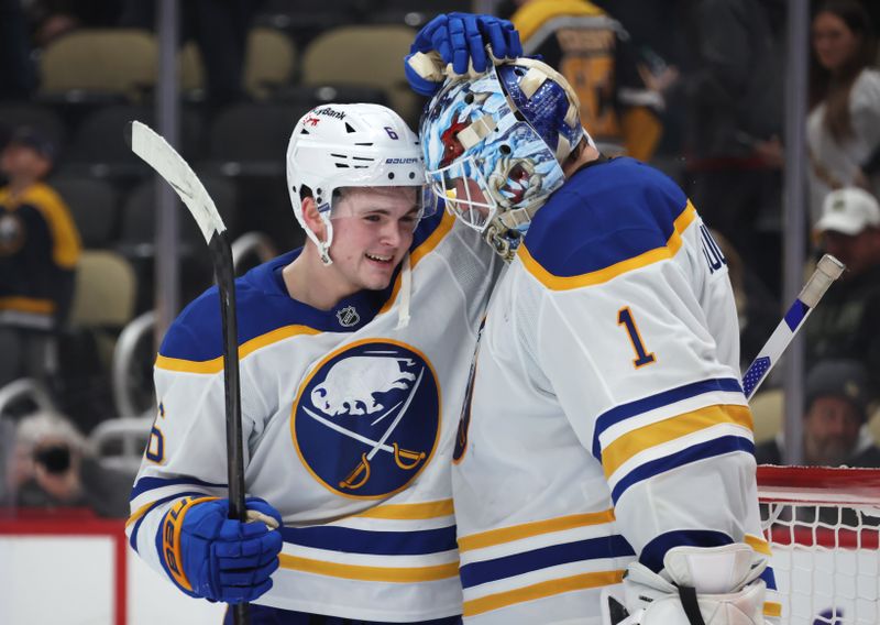Mar 5, 2026; Pittsburgh, Pennsylvania, USA;  Buffalo Sabres left wing Zach Benson (6) and goaltender Ukko-Pekka Luukkonen (1) celebrate after defeating the Pittsburgh Penguins at PPG Paints Arena. Mandatory Credit: Charles LeClaire-Imagn Images