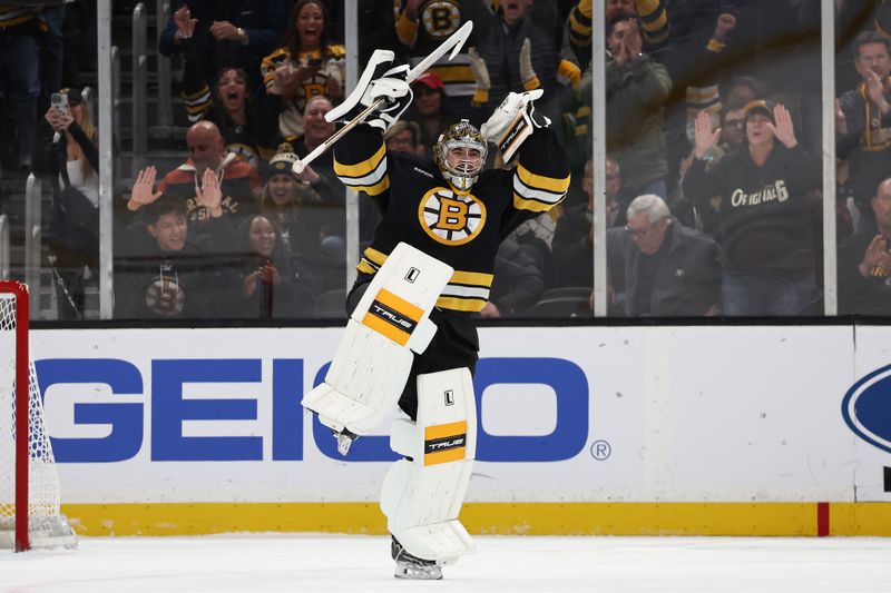 Nov 29, 2025; Boston, Massachusetts, USA; Boston Bruins goaltender Jeremy Swayman (1) celebrates after making the final save during their 3-2 shootout win over the Detroit Red Wings at TD Garden. Mandatory Credit: Winslow Townson-Imagn Images