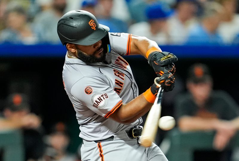 Sep 20, 2024; Kansas City, Missouri, USA; San Francisco Giants left fielder Heliot Ramos (17) hits a triple during the fourth inning against the Kansas City Royals at Kauffman Stadium. Mandatory Credit: Jay Biggerstaff-Imagn Images