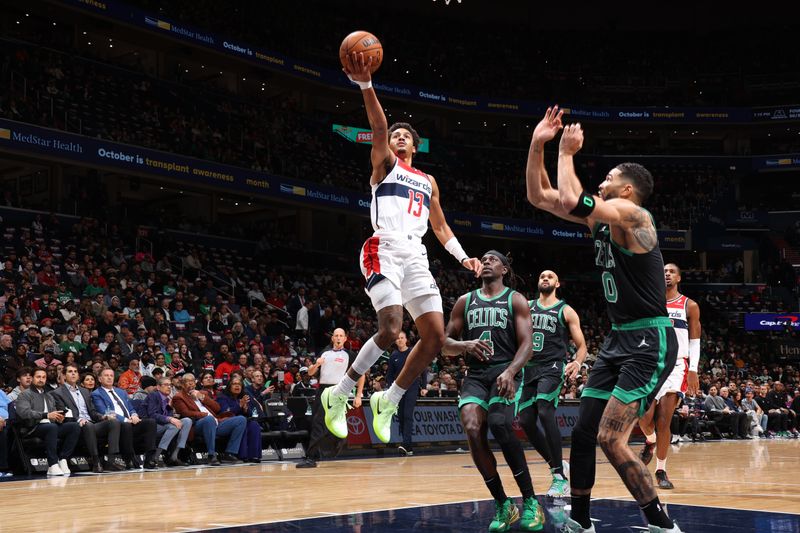 WASHINGTON, DC -? OCTOBER 24: Jordan Poole #13 of the Washington Wizards drives to the basket during the game against the Boston Celtics on October 24, 2024 at Capital One Arena in Washington, DC. NOTE TO USER: User expressly acknowledges and agrees that, by downloading and or using this Photograph, user is consenting to the terms and conditions of the Getty Images License Agreement. Mandatory Copyright Notice: Copyright 2024 NBAE (Photo by Stephen Gosling/NBAE via Getty Images)