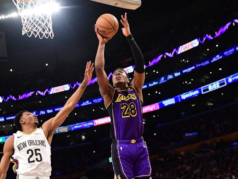 LOS ANGELES, CA - FEBRUARY 9:  Rui Hachimura #28 of the Los Angeles Lakers drives to the basket during the game against the New Orleans Pelicans on February 9, 2024 at Crypto.Com Arena in Los Angeles, California. NOTE TO USER: User expressly acknowledges and agrees that, by downloading and/or using this Photograph, user is consenting to the terms and conditions of the Getty Images License Agreement. Mandatory Copyright Notice: Copyright 2024 NBAE (Photo by Adam Pantozzi/NBAE via Getty Images)