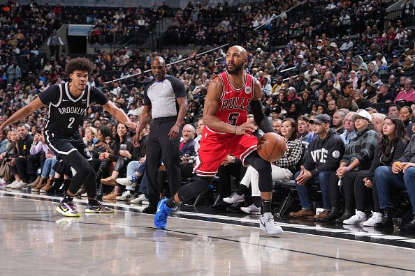 BROOKLYN, NY - NOVEMBER 26: Jevon Carter #5 of the Chicago Bulls drives to the basket during the game against the Brooklyn Nets on November 26, 2023 at Barclays Center in Brooklyn, New York. NOTE TO USER: User expressly acknowledges and agrees that, by downloading and or using this Photograph, user is consenting to the terms and conditions of the Getty Images License Agreement. Mandatory Copyright Notice: Copyright 2023 NBAE (Photo by Jesse D. Garrabrant/NBAE via Getty Images)