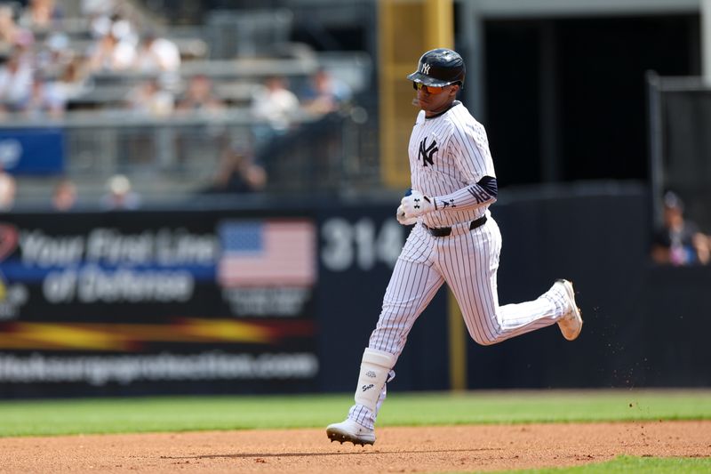 Mar 3, 2024; Tampa, Florida, USA;  New York Yankees left fielder Juan Soto (22) runs the bases after hittting a solo home run against the Detroit Tigers in the first inning at George M. Steinbrenner Field. Mandatory Credit: Nathan Ray Seebeck-USA TODAY Sports