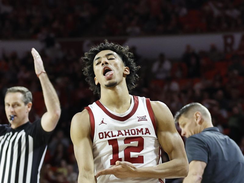 Jan 6, 2024; Norman, Oklahoma, USA; Oklahoma Sooners guard Milos Uzan (12) gestures after scoring a three point basket against the Iowa State Cyclones during the second half at Lloyd Noble Center. Mandatory Credit: Alonzo Adams-USA TODAY Sports