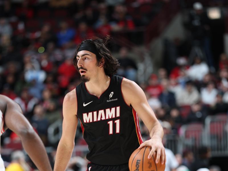 CHICAGO, IL - FEBRUARY 4:  Jaime Jaquez Jr. #11 of the Miami Heat dribbles the ball during the game against the Chicago Bulls on February 4 2025 at United Center in Chicago, Illinois. NOTE TO USER: User expressly acknowledges and agrees that, by downloading and or using this photograph, User is consenting to the terms and conditions of the Getty Images License Agreement. Mandatory Copyright Notice: Copyright 2025 NBAE (Photo by Jeff Haynes/NBAE via Getty Images)