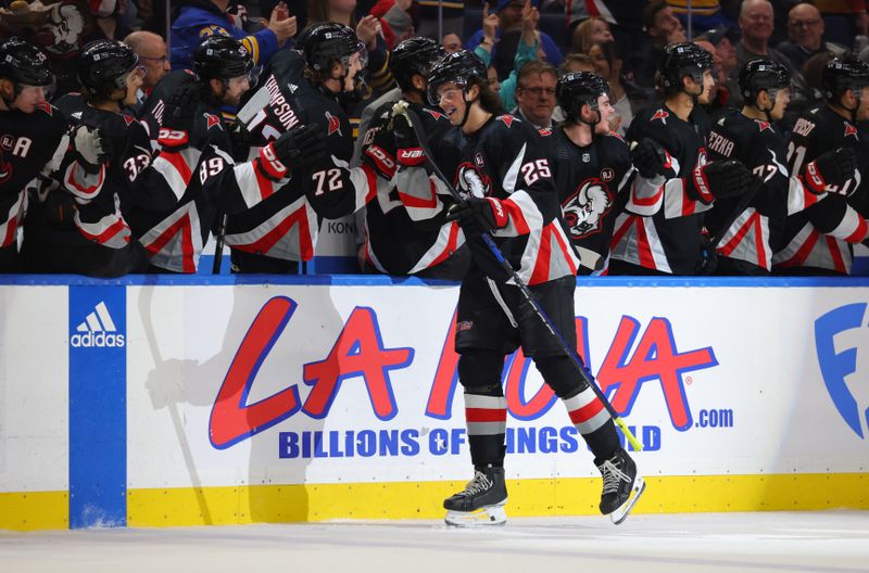 Mar 2, 2024; Buffalo, New York, USA;  Buffalo Sabres defenseman Owen Power (25) celebrates his goal with teammates during the third period against the Vegas Golden Knights at KeyBank Center. Mandatory Credit: Timothy T. Ludwig-USA TODAY Sports