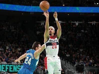 MILWAUKEE, WI - NOVEMBER 24: Landry Shamet #20 of the Washington Wizards shoots a three point basket against the Milwaukee Bucks during the In-Season Tournament on November 24, 2023 at the Fiserv Forum Center in Milwaukee, Wisconsin. NOTE TO USER: User expressly acknowledges and agrees that, by downloading and or using this Photograph, user is consenting to the terms and conditions of the Getty Images License Agreement. Mandatory Copyright Notice: Copyright 2023 NBAE (Photo by Gary Dineen/NBAE via Getty Images).