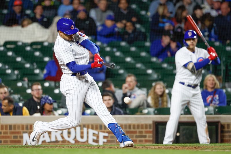 May 25, 2023; Chicago, Illinois, USA; Chicago Cubs center fielder Christopher Morel (5) singles against the New York Mets during the eight inning at Wrigley Field. Mandatory Credit: Kamil Krzaczynski-USA TODAY Sports