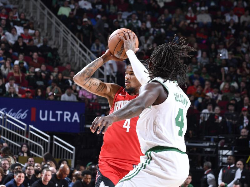 HOUSTON, TX - JANUARY 3:  Jalen Green #4 of the Houston Rockets looks to pass the ball during the game against the Boston Celtics on January 3, 2025 at the Toyota Center in Houston, Texas. NOTE TO USER: User expressly acknowledges and agrees that, by downloading and or using this photograph, User is consenting to the terms and conditions of the Getty Images License Agreement. Mandatory Copyright Notice: Copyright 2025 NBAE (Photo by Logan Riely/NBAE via Getty Images)