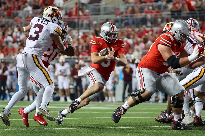 Oct 4, 2025; Columbus, Ohio, USA; Ohio State Buckeyes quarterback Lincoln Kienholz (3) runs the ball during the fourth quarter against the Minnesota Golden Gophers at Ohio Stadium. Mandatory Credit: Joseph Maiorana-Imagn Images