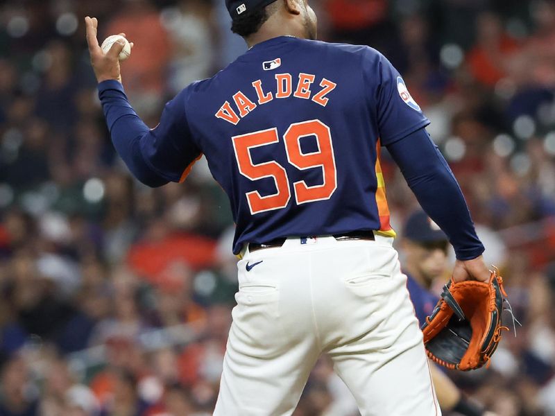 May 15, 2024; Houston, Texas, USA; Houston Astros pitcher Framber Valdez (59) reacts after a ball is called on him against the Oakland Athletics in the seventh inning at Minute Maid Park. Mandatory Credit: Thomas Shea-USA TODAY Sports